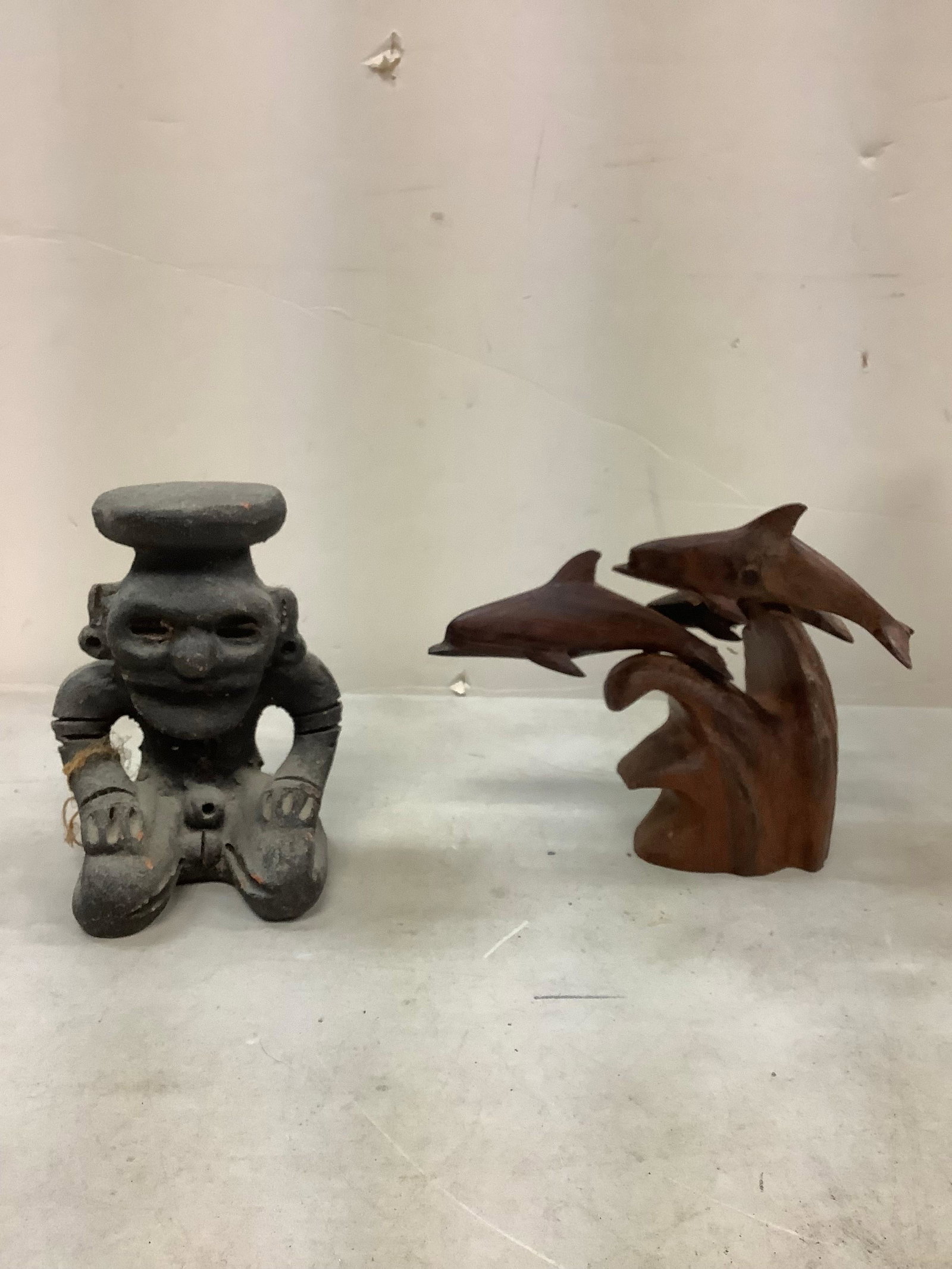 Lot of dolpin figurine and man statue: Lot of dolpin figurine and man statue