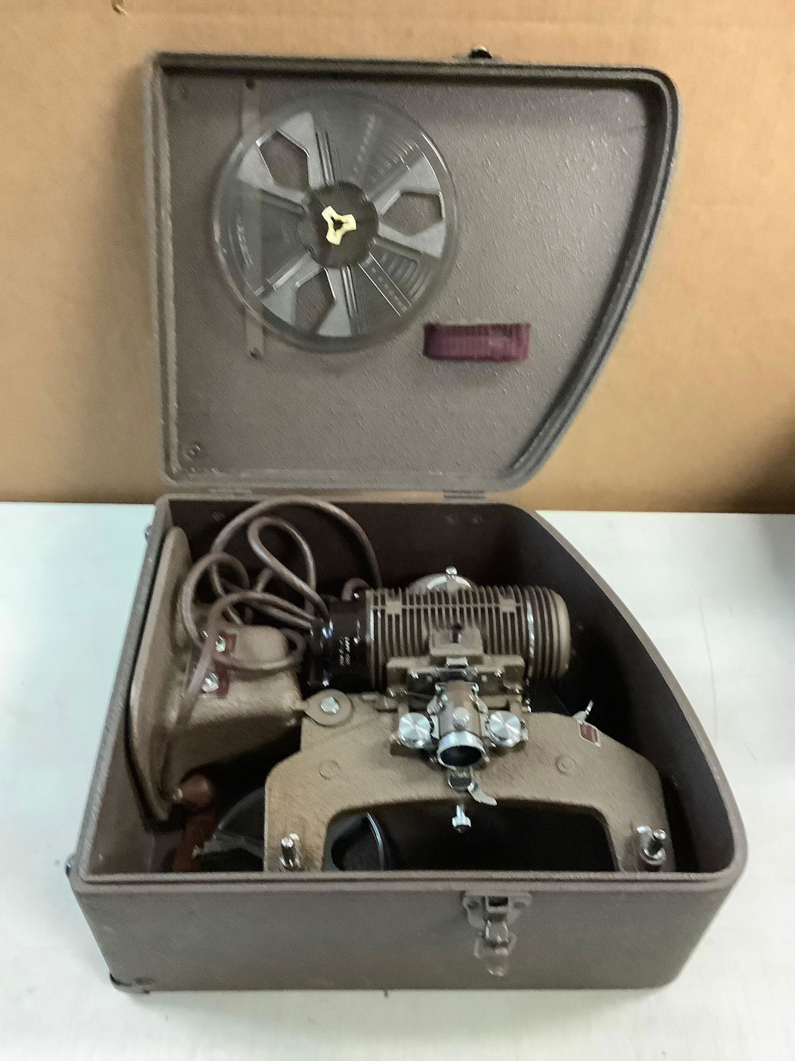 Vintage movie projector bell & howell works: Vintage movie projector bell & howell works