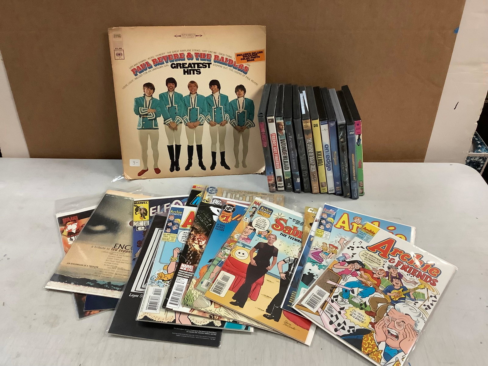 Lot of beetles record, DVD movies, MARVEL, DC, ARCHIE and more comics: Lot of beetles record, DVD movies, MARVEL, DC, ARCHIE and more comics