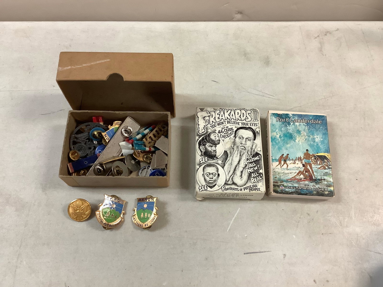 Lot of Freakards (Set of 46 Playing Cards), Delta Air Lines Fort Lauderdale Playing Cards, and Box: Lot of Freakards (Set of 46 Playing Cards), Delta Air Lines Fort Lauderdale Playing Cards, and Box of Military Medal Pins/Regular Pins