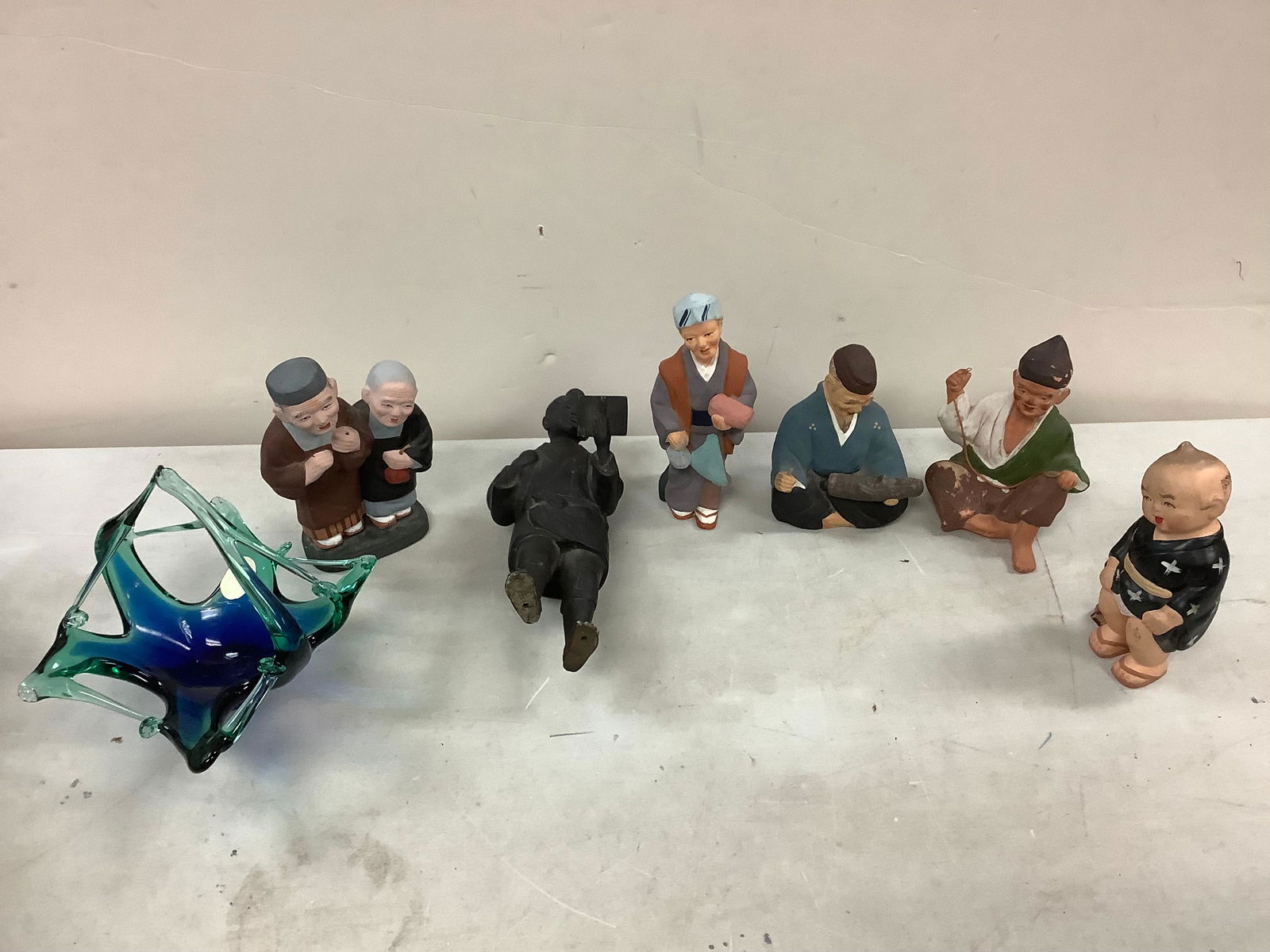 Lot of castiron, hard plastic, wood, pottery figures and candy dish (1 of 1)