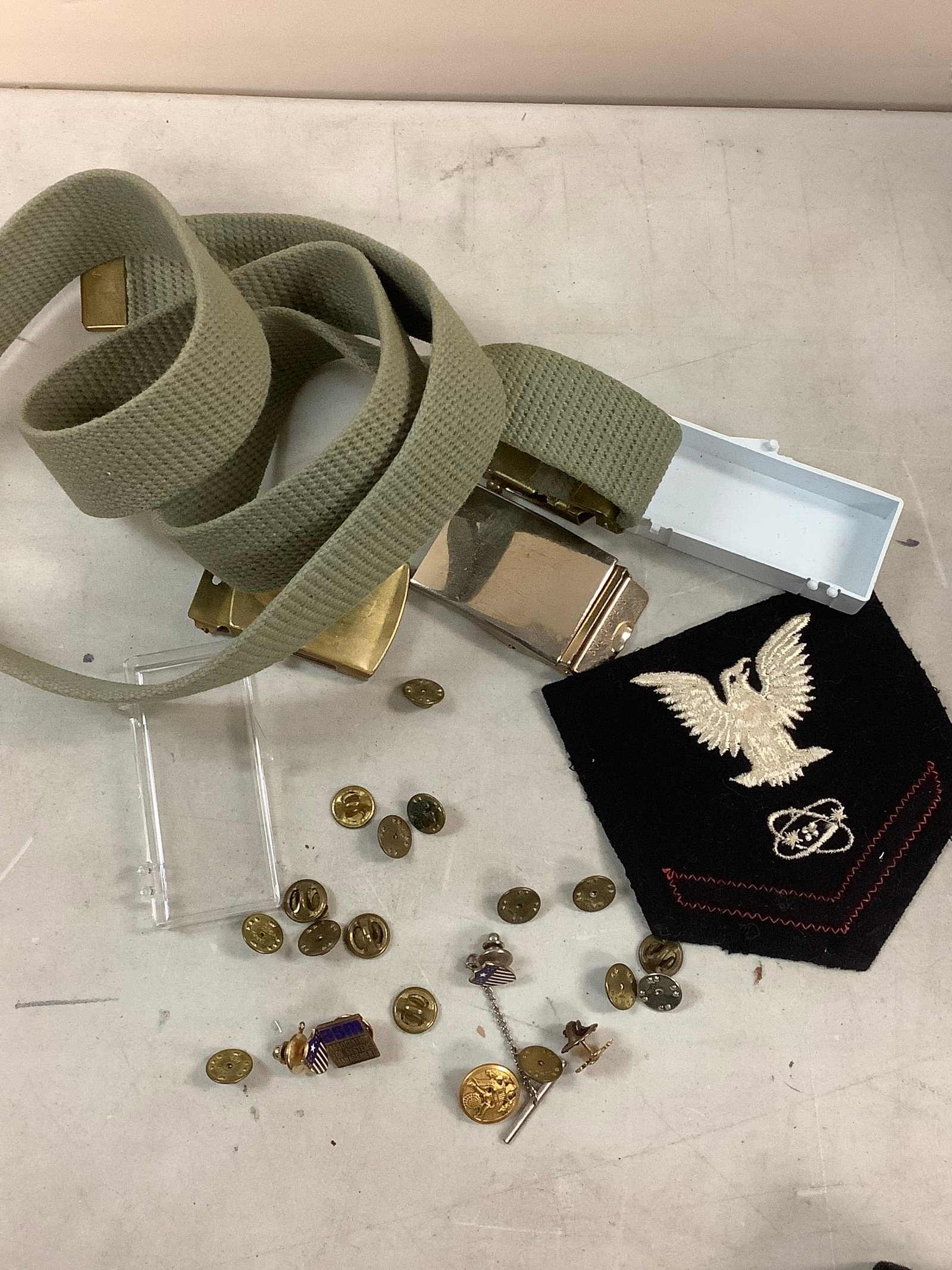 Lot of military pins, belt buckles, and more: Lot of military pins, belt buckles, and more