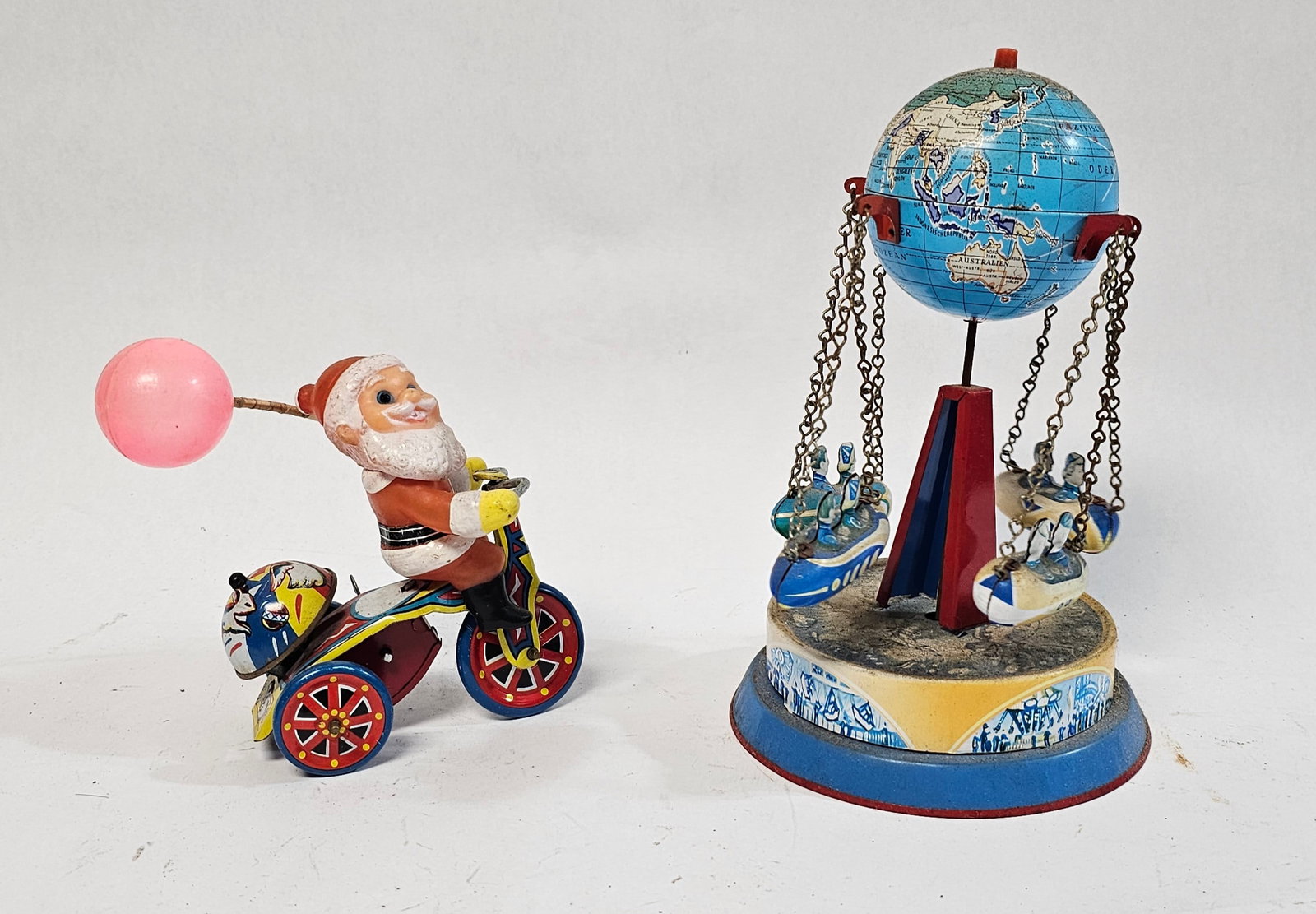 Vintage Tin and Plastic Santa and German Whirligig: taller 8"