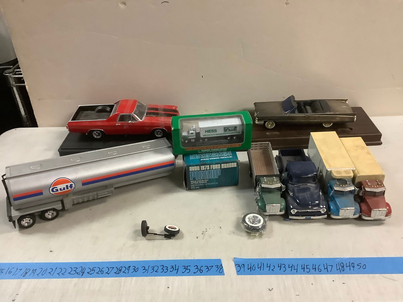 Lot of Mini HESS truck truck, GULF tanker, model cars with stands, spare wheels and more (1 of 1)
