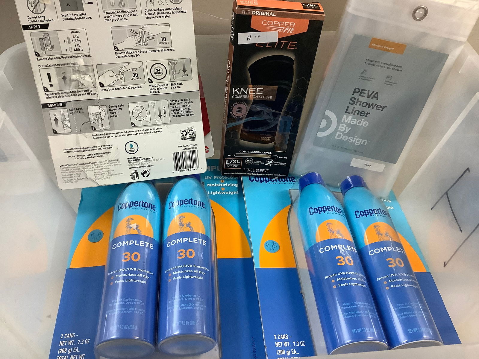 Lot of command hooks, coppertone spray sun lotion (SPF - 30) and more (1 of 1)