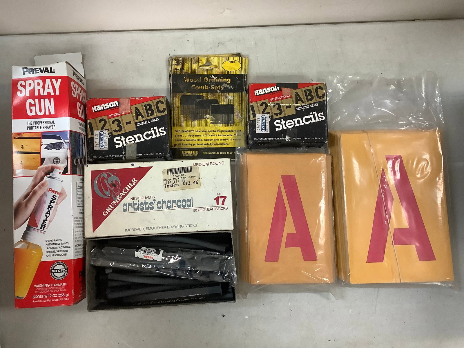 Lot of stencils, spray gun, artists charcoal and more: Lot of stencils, spray gun, artists charcoal and more