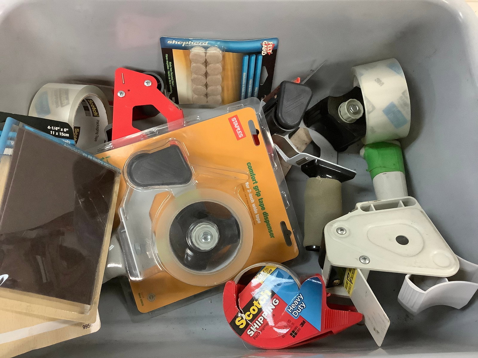 Lot of tape guns, packing tape, and more: Lot of tape guns, packing tape, and more