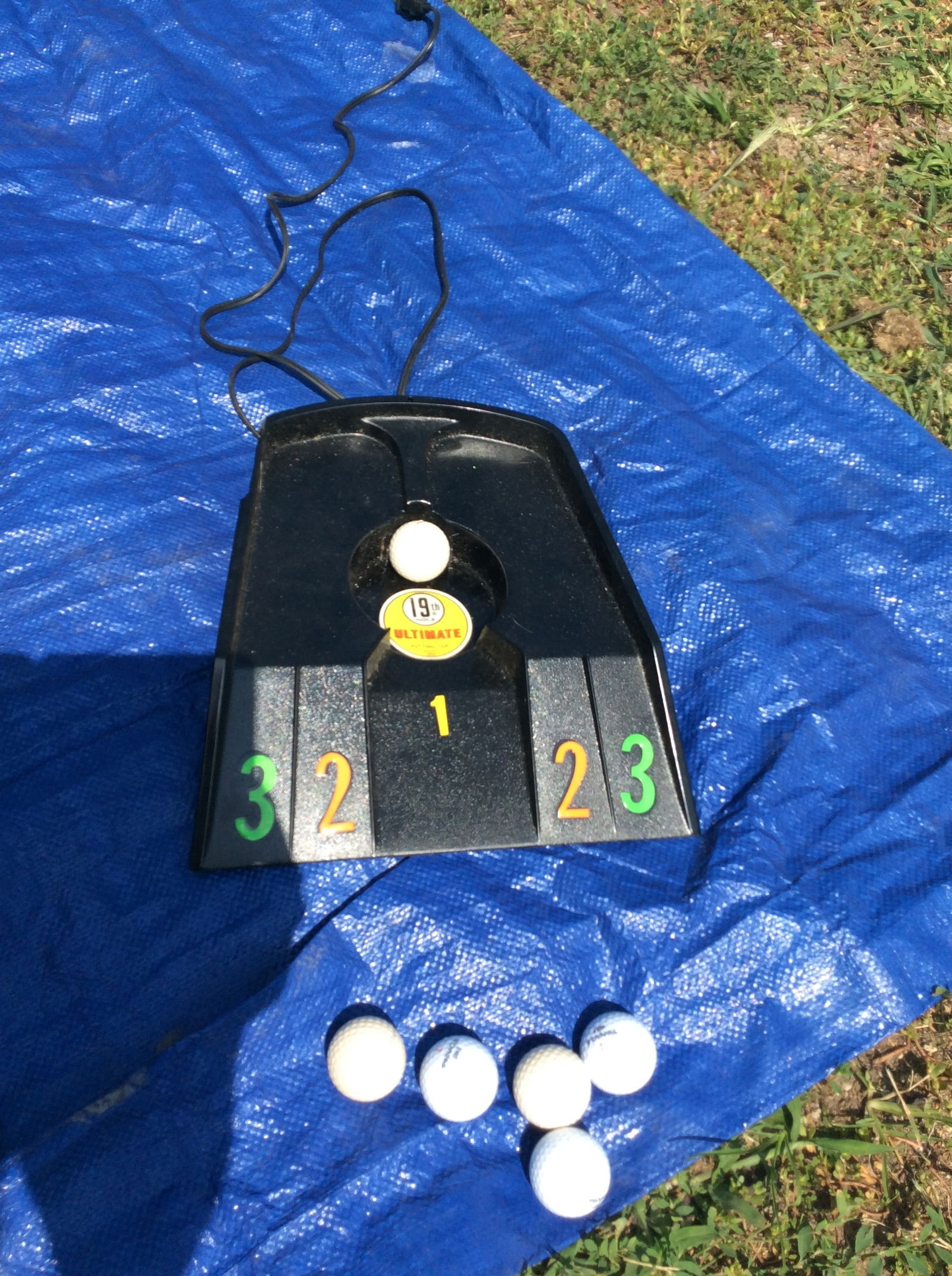 The Ultimate Electric 19 th  Hole Putting Cups and Balls (1 of 1)