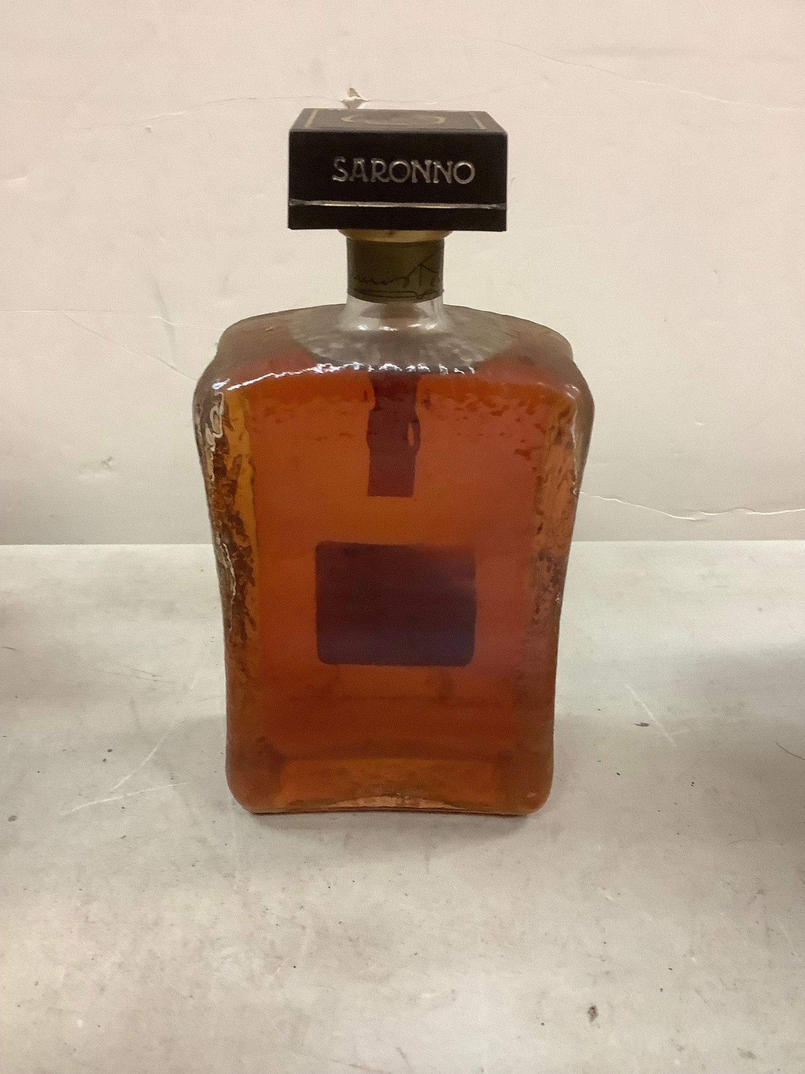 Sealed Saronno Amaretto: Any contents in bottle is Free; You are bidding on the bottle & unbroken tax stamp
