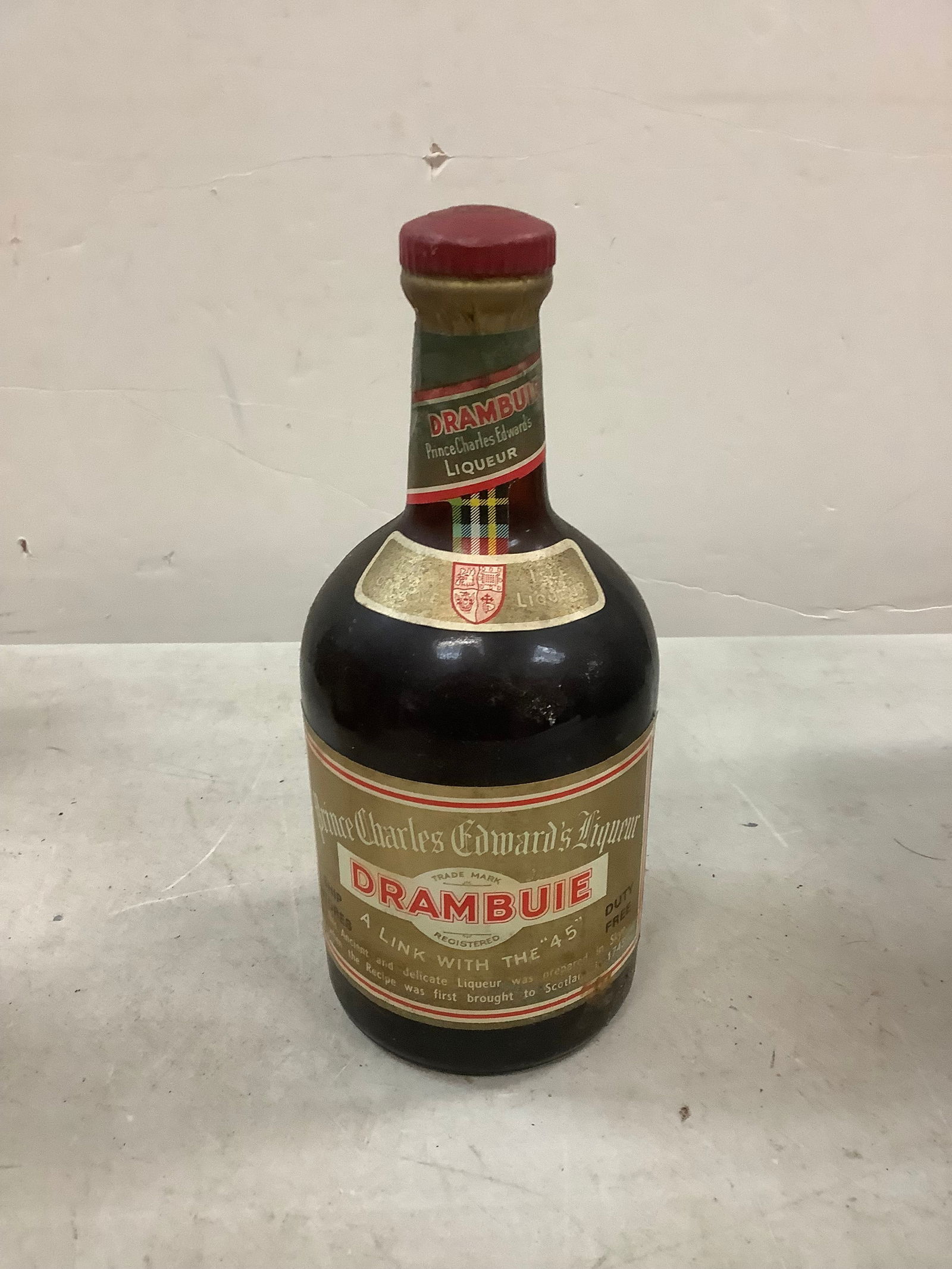Sealed Prince Charles Edward's Liqueur Drambuie: Any contents in bottle is Free; You are bidding on the bottle & unbroken tax stamp