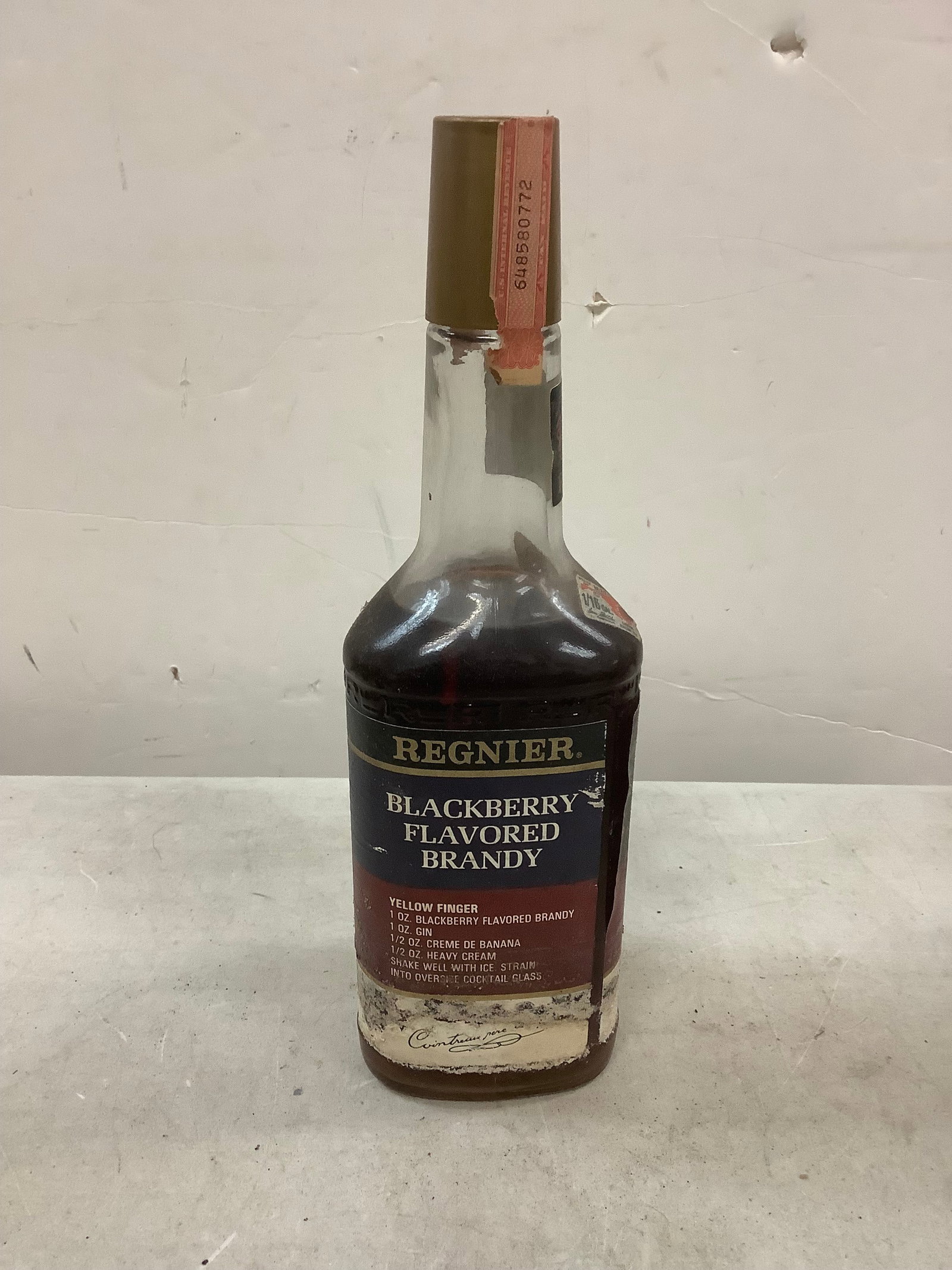 Sealed Regnier Blackberry Flavored Brandy 3/4 Quart: Any contents in bottle is Free; You are bidding on the bottle & unbroken tax stamp