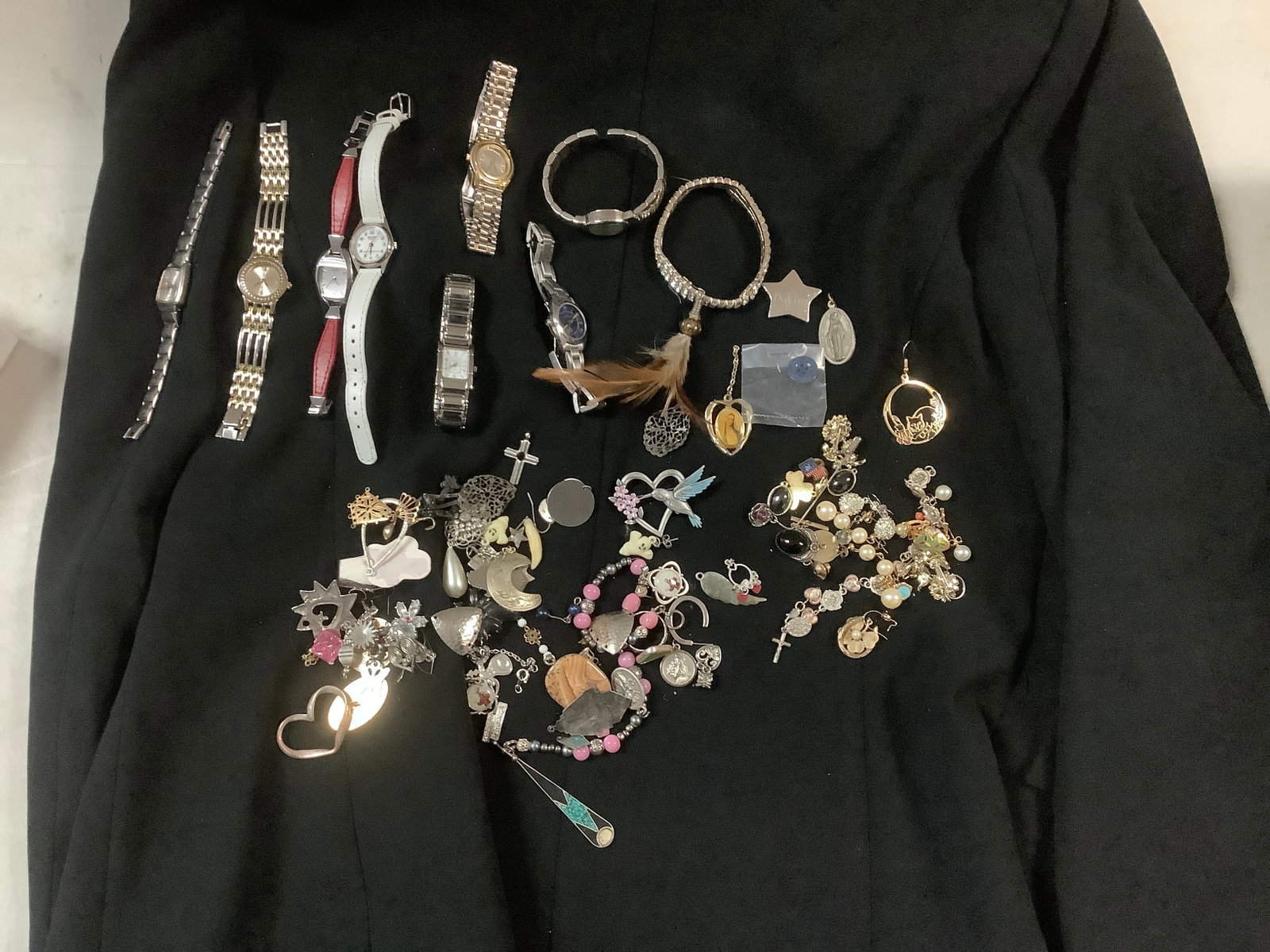 Lots of watches, bracelets and earrings: Lots of watches, bracelets and earrings