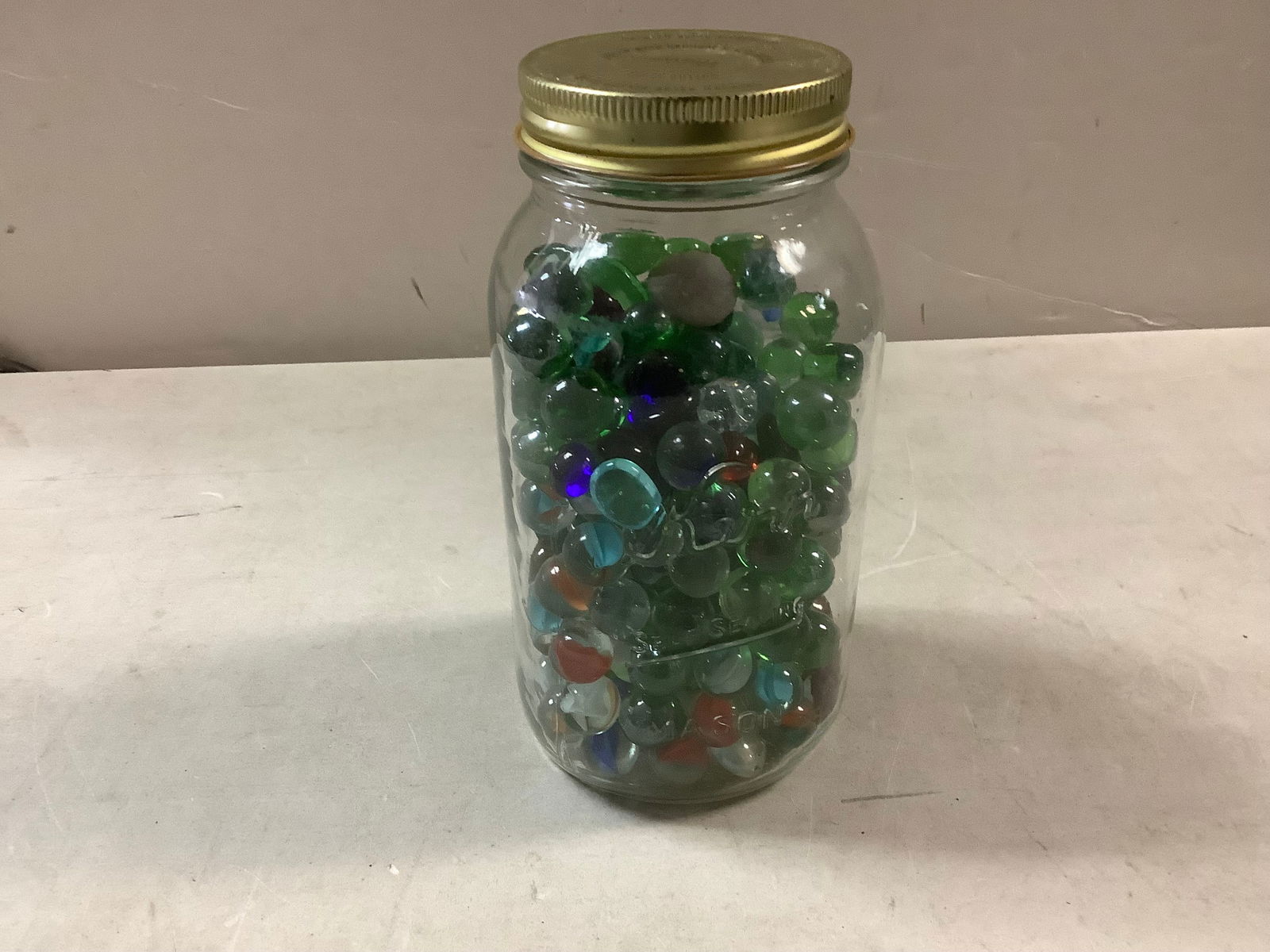 Mason jar of marbles and pebbles (1 of 1)