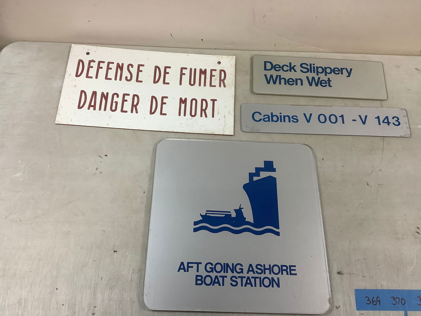 Lot of Cruise Ship Signs (1 of 1)