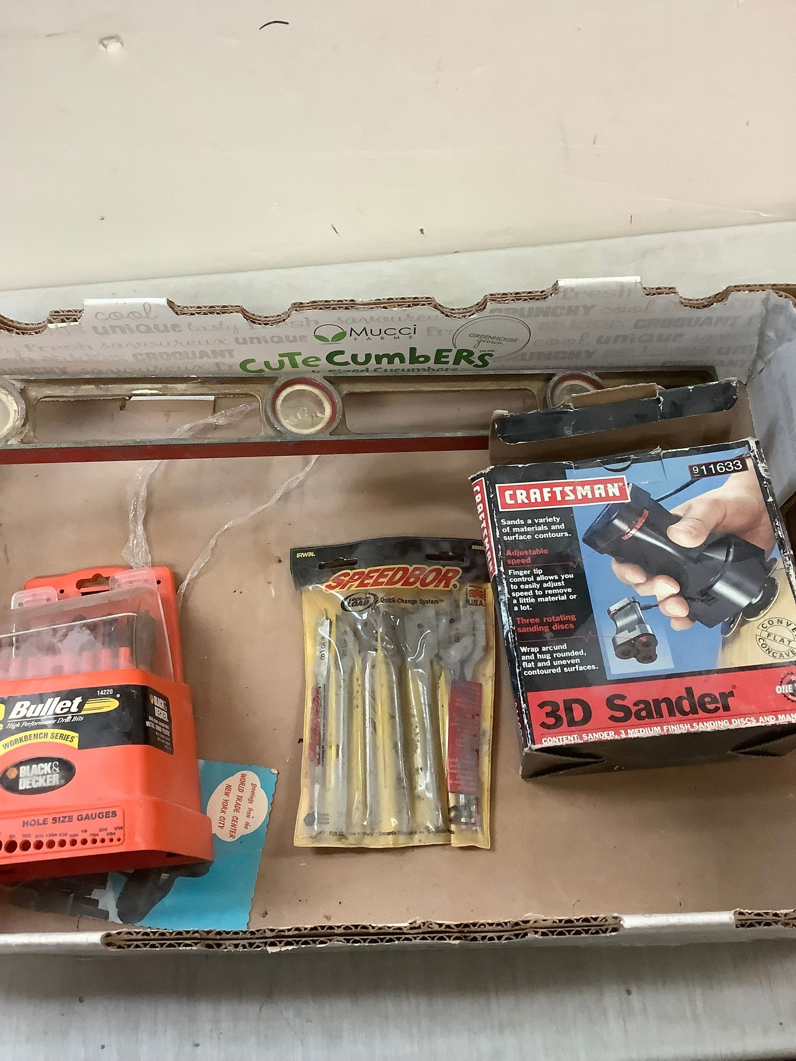 Assorted drill bits, levels and hand sander (1 of 1)