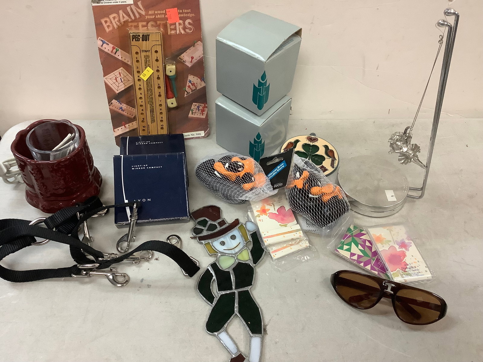 Lot of sunglasses, decorative ornaments, dragonfly votive holders, and more: Lot of sunglasses, decorative ornaments, dragonfly votive holders, and more