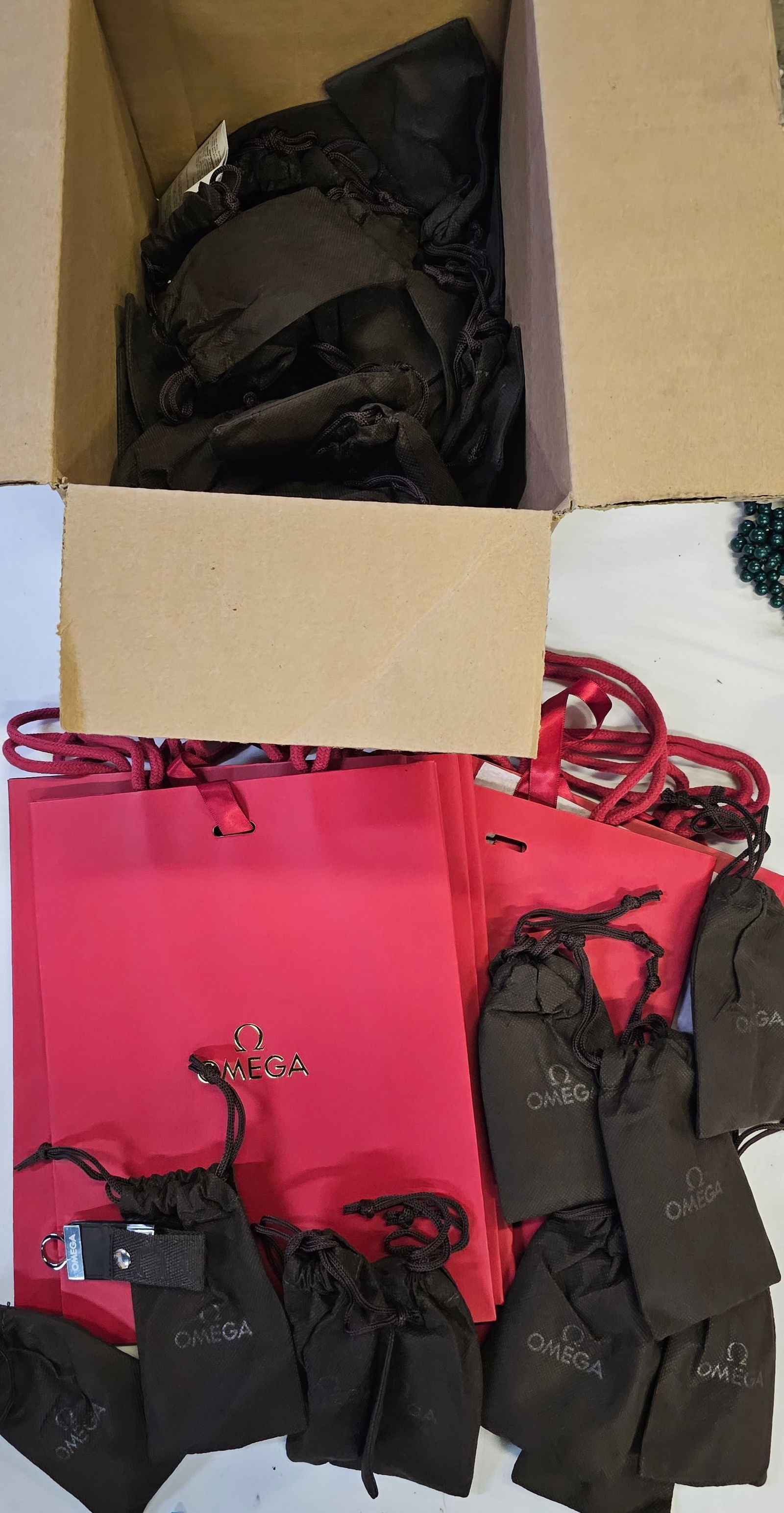 New Omega Watch Bags and Memory Card Keychains: New Omega Watch Bags and Memory Card Keychains