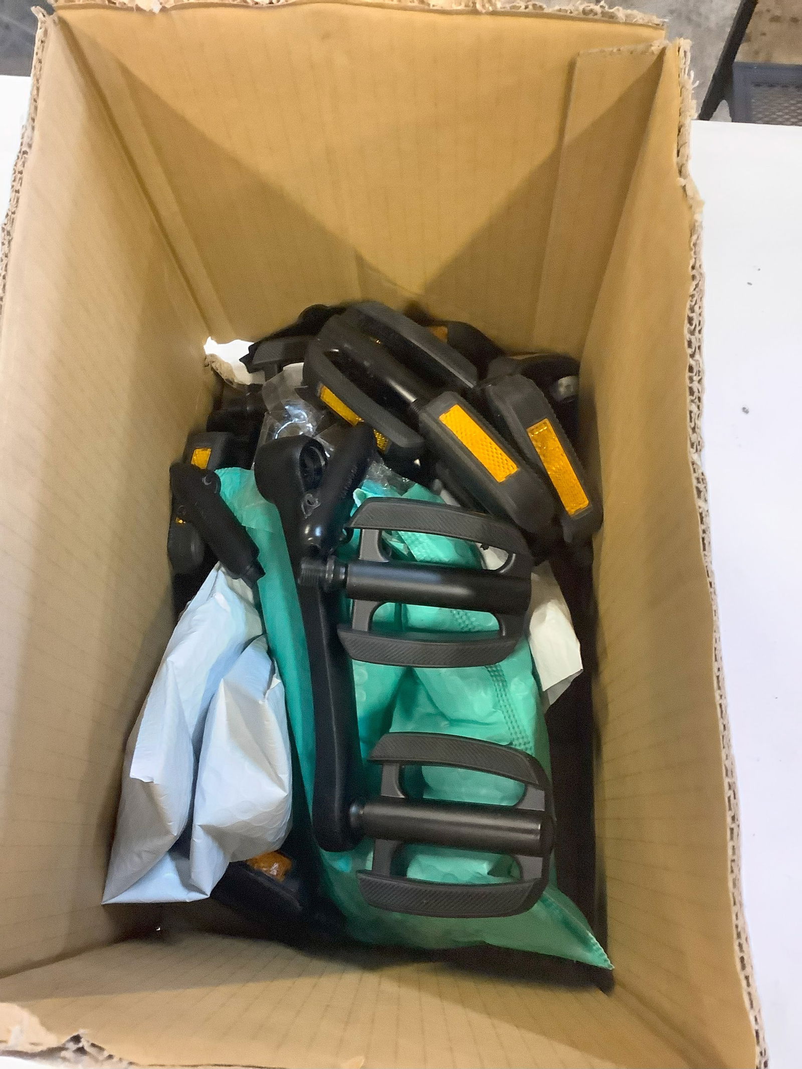 Lot of spare bike pedals and attachment parts (1 of 1)