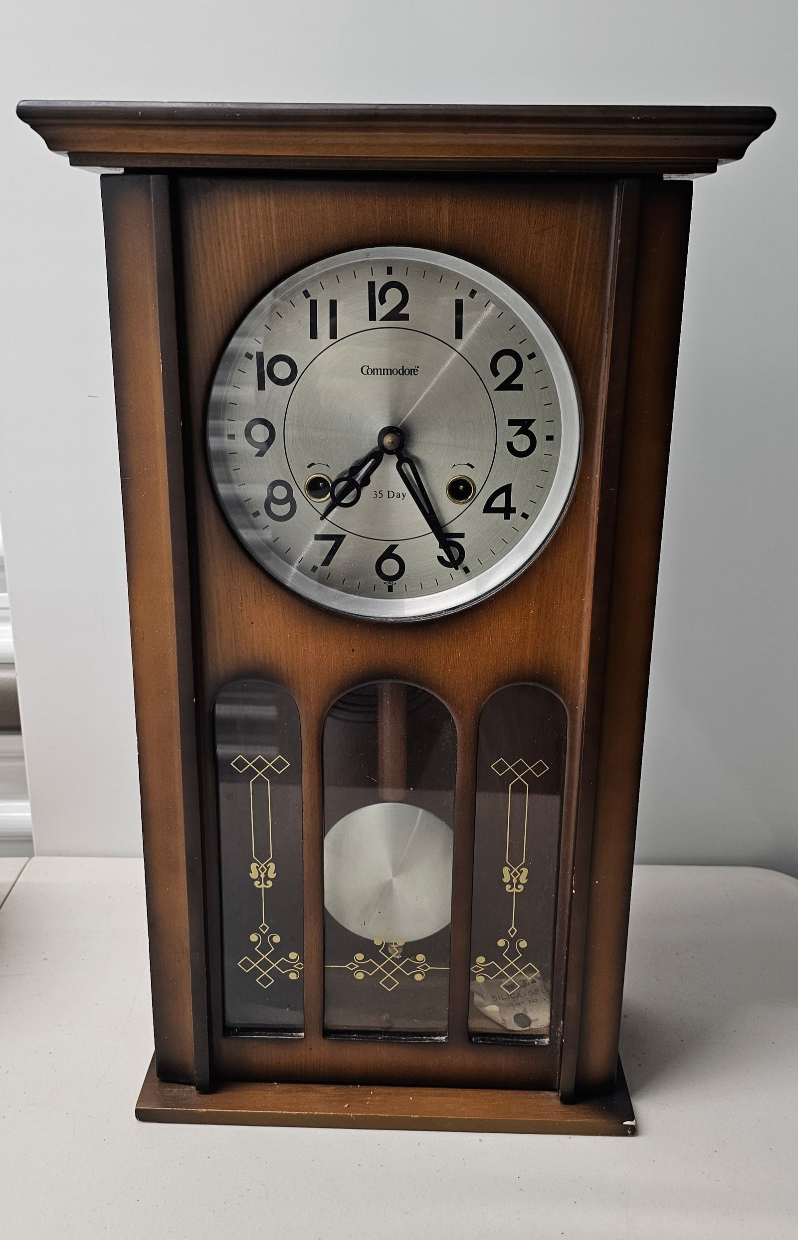 Vintage Commodore Wall Clock: 20x12x5"