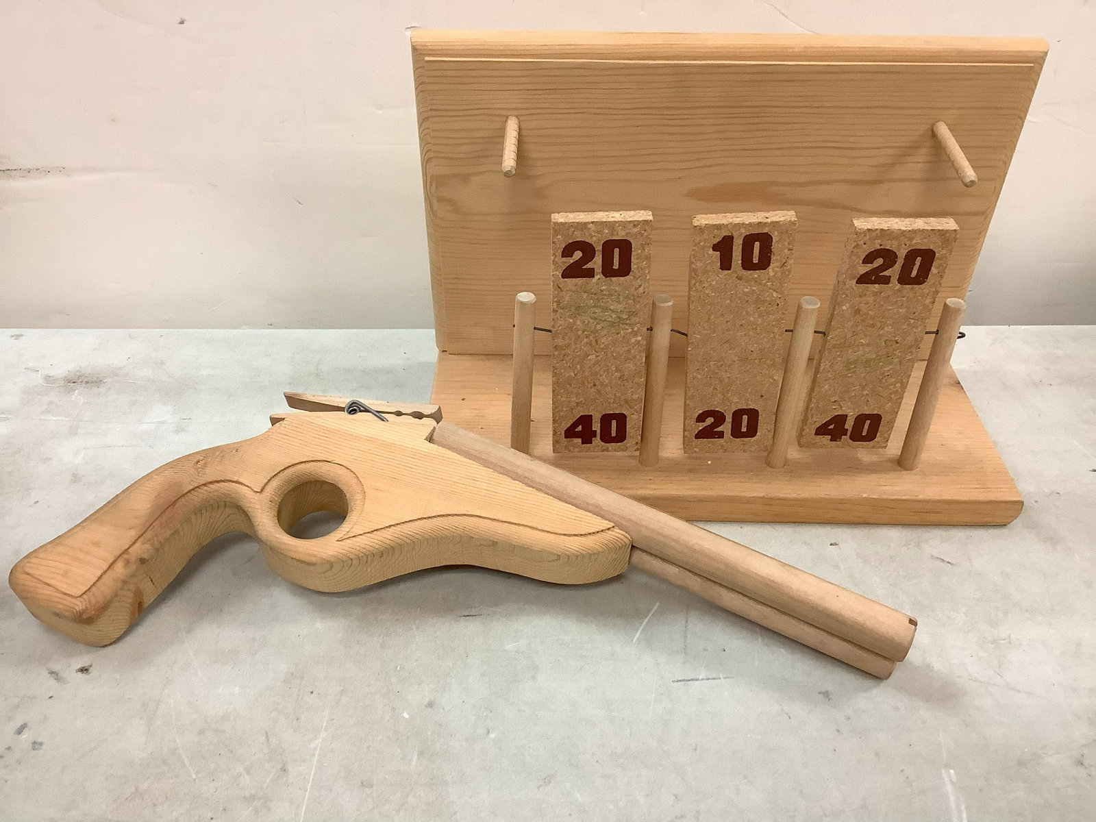 Wooden rubber band shooter gun and target practice: Wooden rubber band shooter gun and target practice