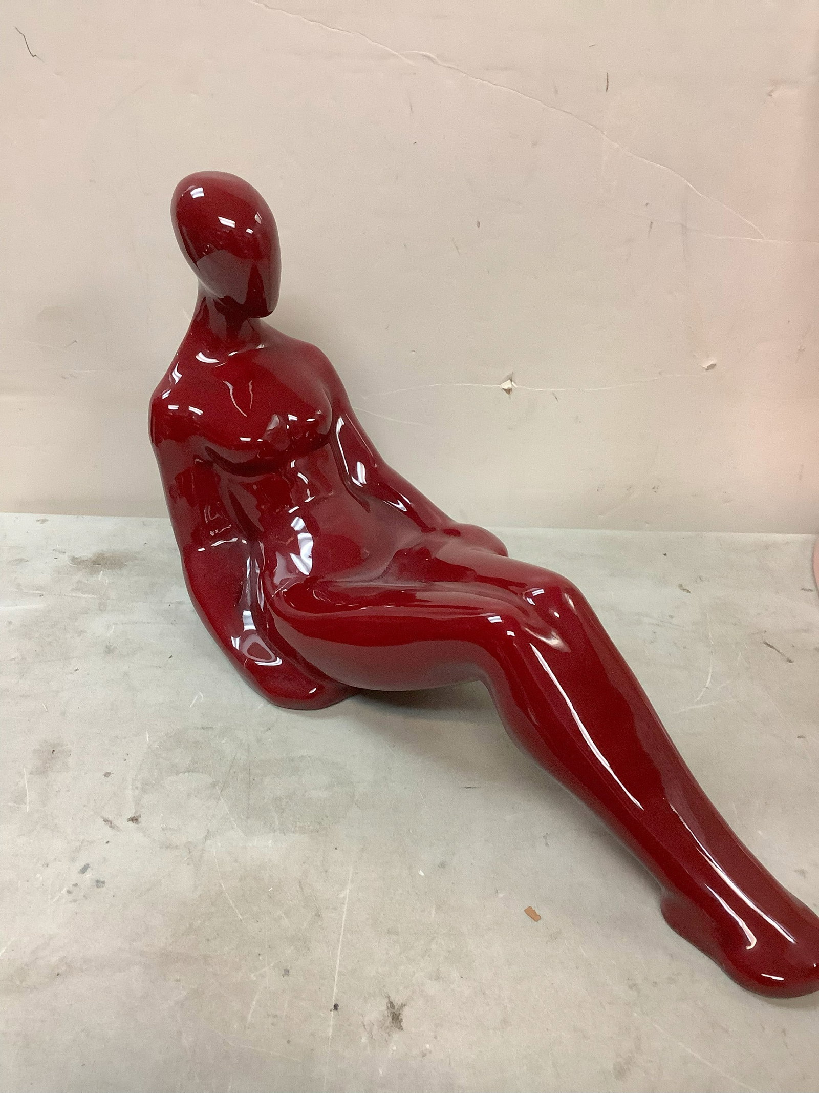 Art deco Red person statue 19in.long, 10in.tall: Art deco Red person statue 19in.long, 10in.tall