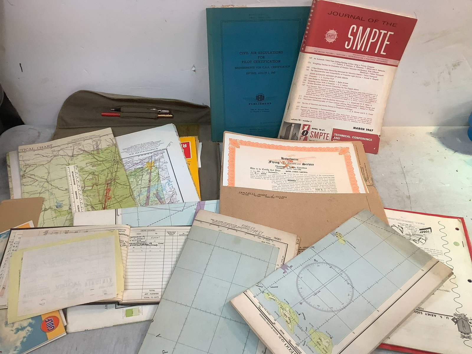 Lot of flight/pilot books, maps, and more: Lot of flight/pilot books, maps, and more