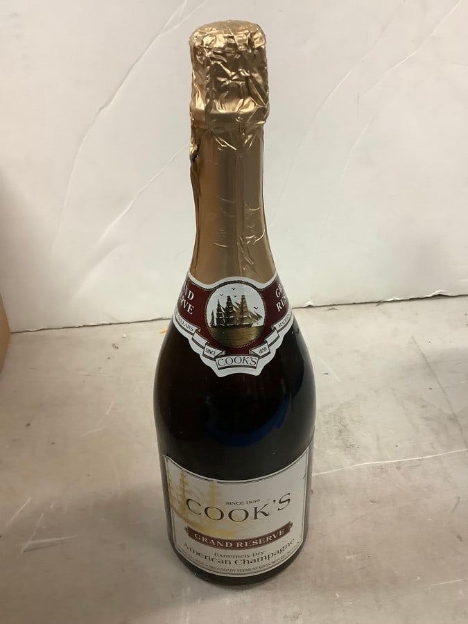 Cook's Grand Reserve Extremely Dry American Champagne: Any contents in bottle is Free; You are bidding on the bottle & unbroken tax stamp