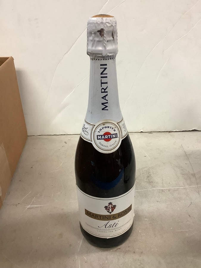 Martini & Rossi Asti Sparkling Wine: Any contents in bottle is Free; You are bidding on the bottle & unbroken tax stamp