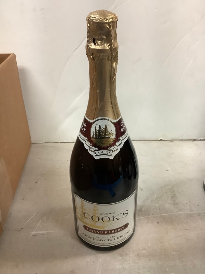 Cook's Grand Reserve Extremely Dry American Champagne: Any contents in bottle is Free; You are bidding on the bottle & unbroken tax stamp