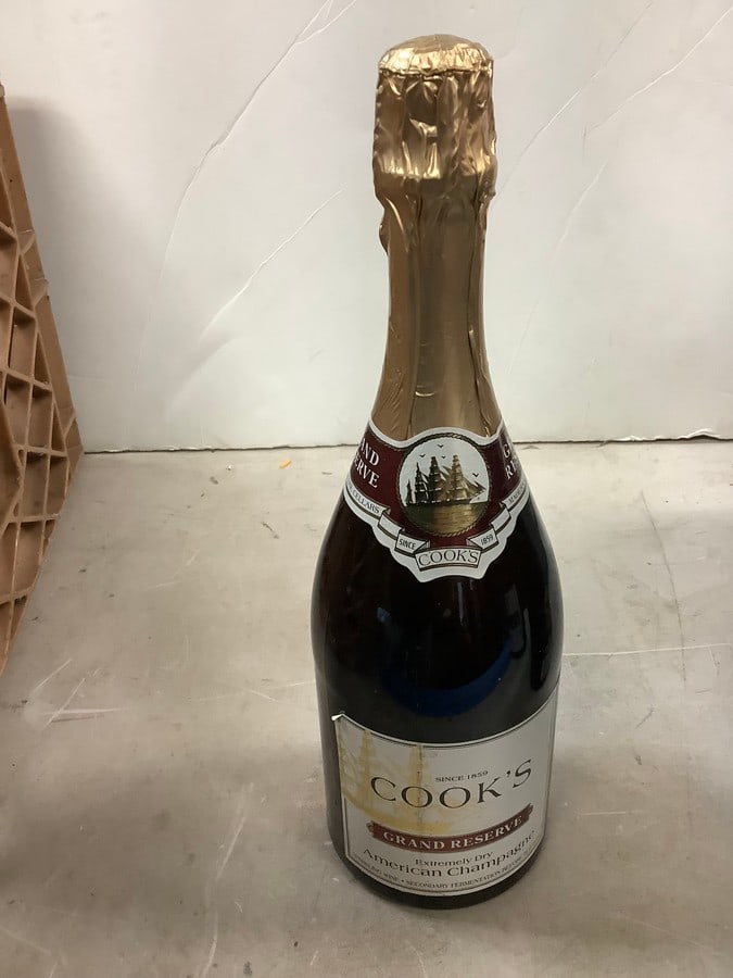 Cook's Grand Reserve Extremely Dry American Champagne: Any contents in bottle is Free; You are bidding on the bottle & unbroken tax stamp
