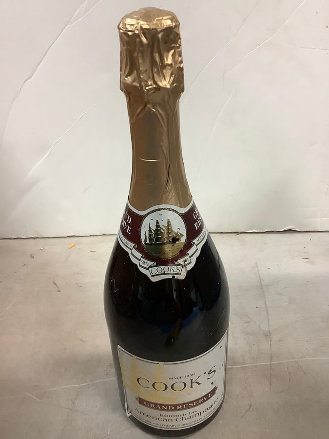 Cook's Grand Reserve Extremely Dry American Champagne: Any contents in bottle is Free; You are bidding on the bottle & unbroken tax stamp