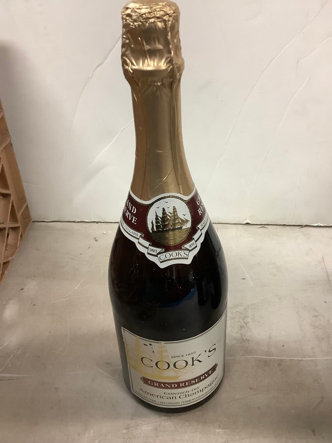 Cook's Grand Reserve Extremely Dry American Champagne: Any contents in bottle is Free; You are bidding on the bottle & unbroken tax stamp