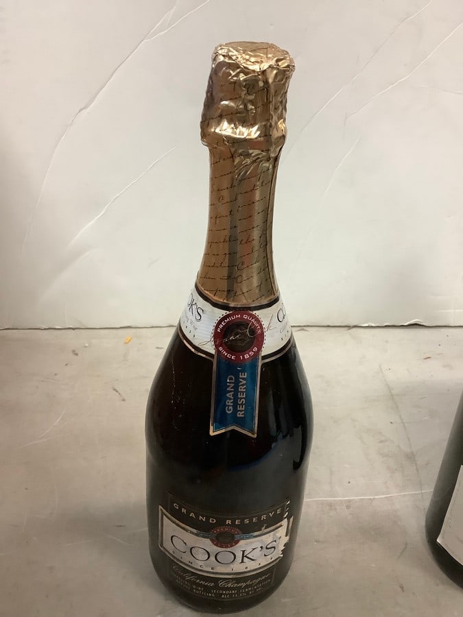 Cook's Grand Reserve Extremely Dry American Champagne: Any contents in bottle is Free; You are bidding on the bottle & unbroken tax stamp