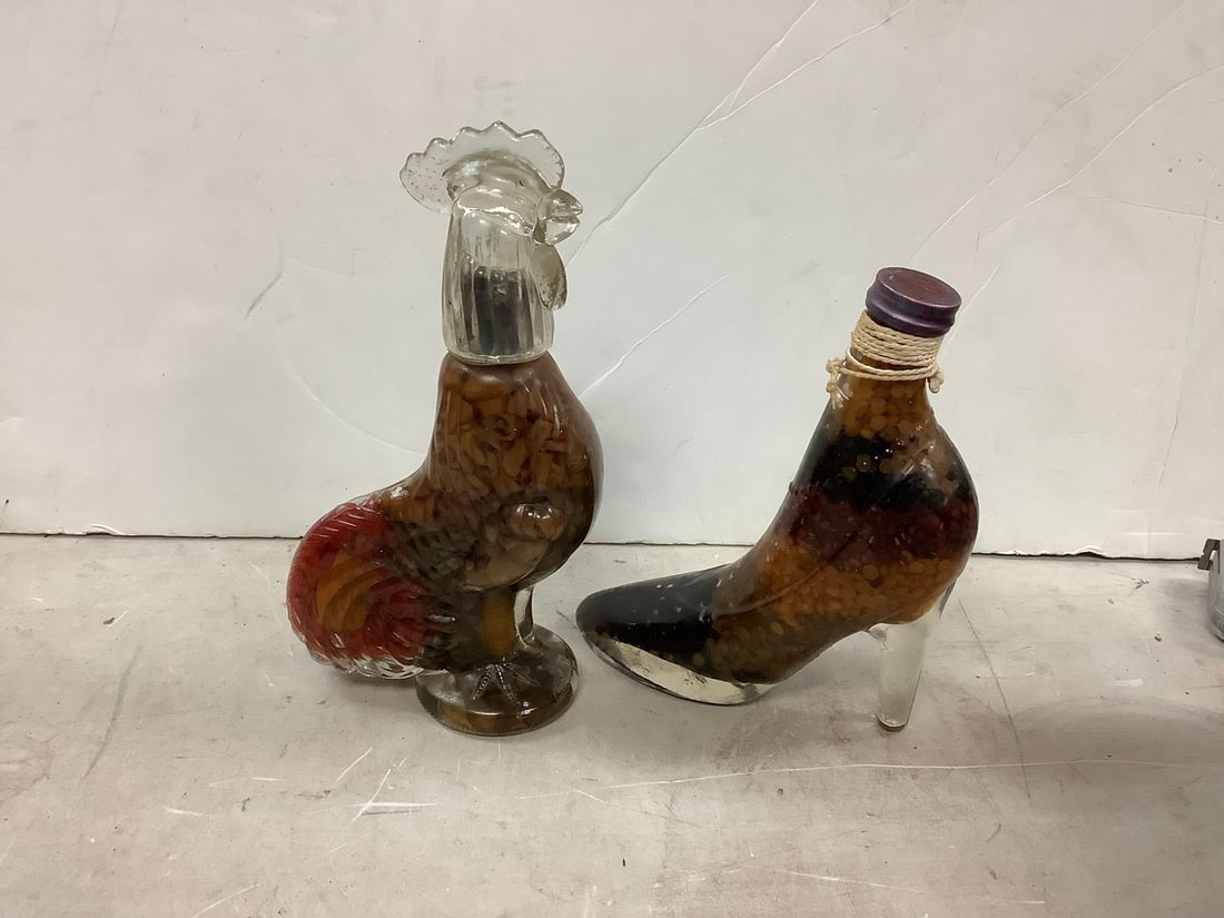 Lot of sealed heal bottle and rooster bottle 11in tallest: Lot of sealed heal bottle and rooster bottle 11in tallest