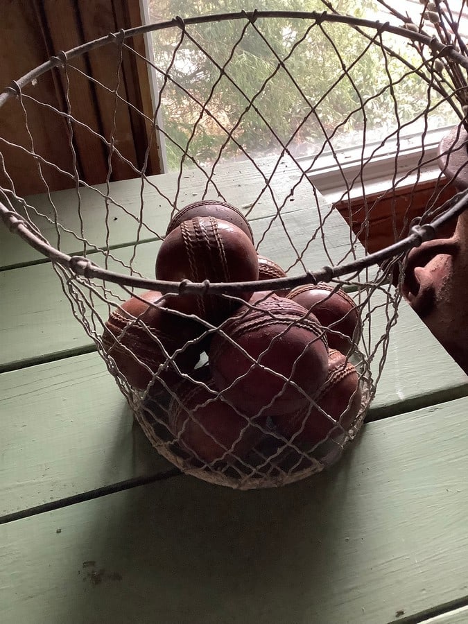 wire basket and leather bound balls (1 of 1)