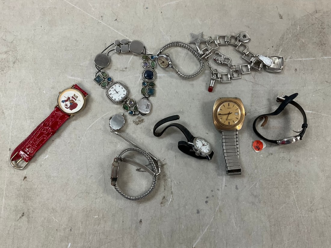 Lot of watches and charm bracelet: Lot of watches and charm bracelet