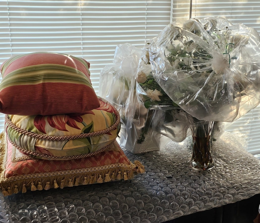 Pillows and Faux Floral Arrangements in Vases: Pillows and Faux Floral Arrangements in Vases
