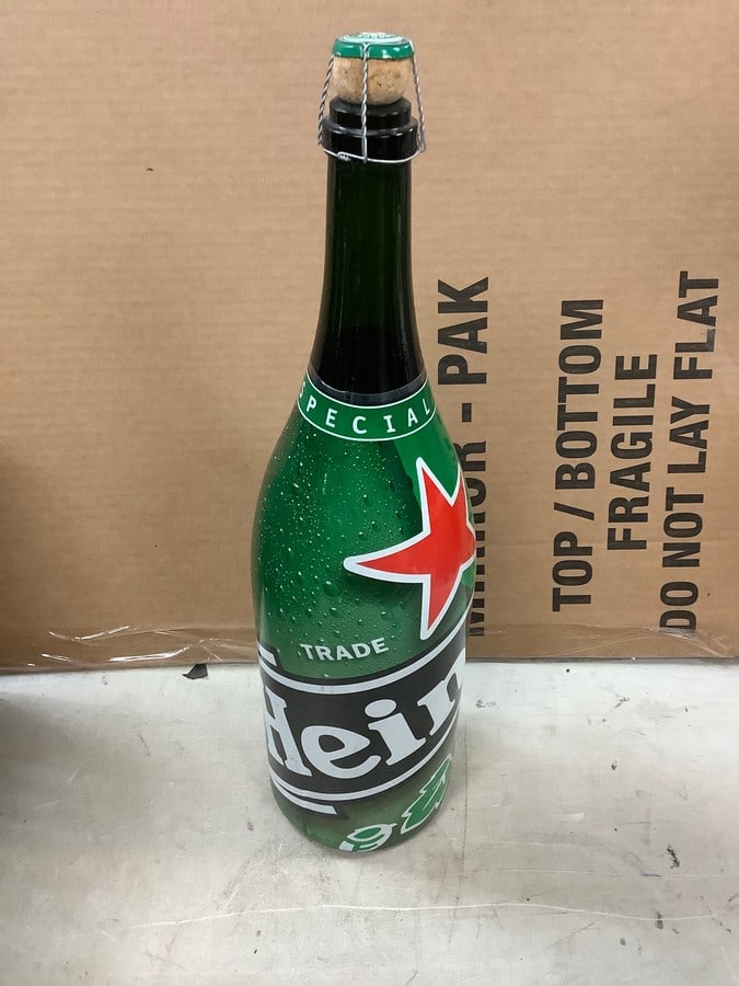 Heinken Bottle 20": Any contents in bottle is Free; You are bidding on the bottle & unbroken tax stamp