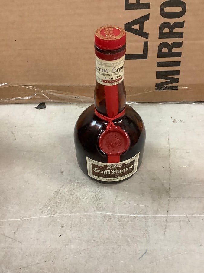 Grand Marnier Liqueur: Any contents in bottle is Free; You are bidding on the bottle & unbroken tax stamp