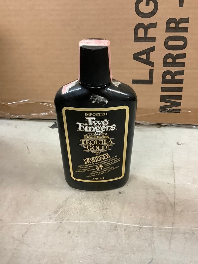 Two Fingers Dos Dedos Tequila: Any contents in bottle is Free; You are bidding on the bottle & unbroken tax stamp