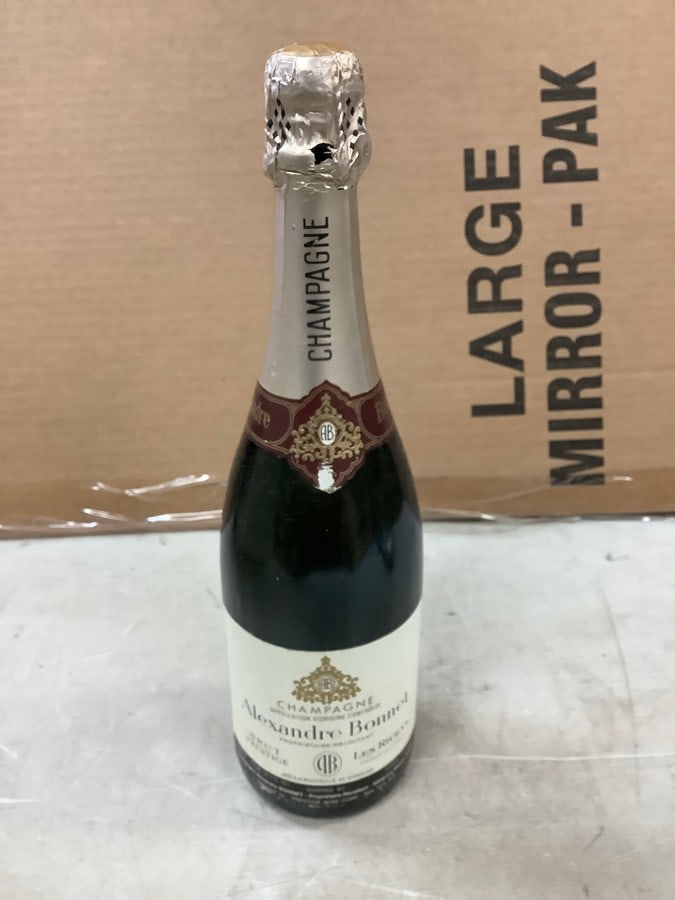 Alexandre Bonnet Champagne Sealed: Any contents in bottle is Free; You are bidding on the bottle & unbroken tax stamp