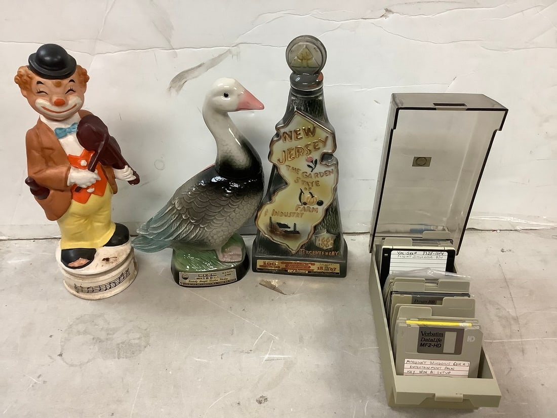 Lot of vintage computer discs, decorative decanters(tallest 9.5in.) (1 of 1)