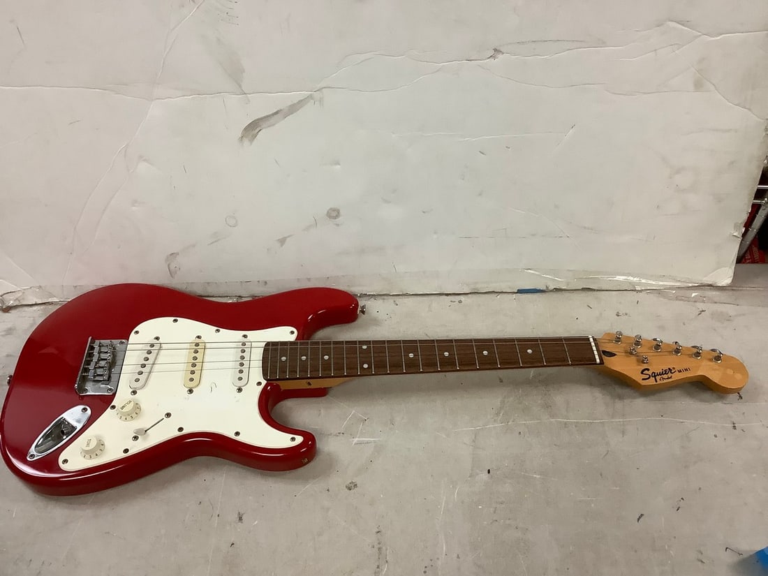 Squier Mini guitar with spongebob stickers on back 35.5" (1 of 1)