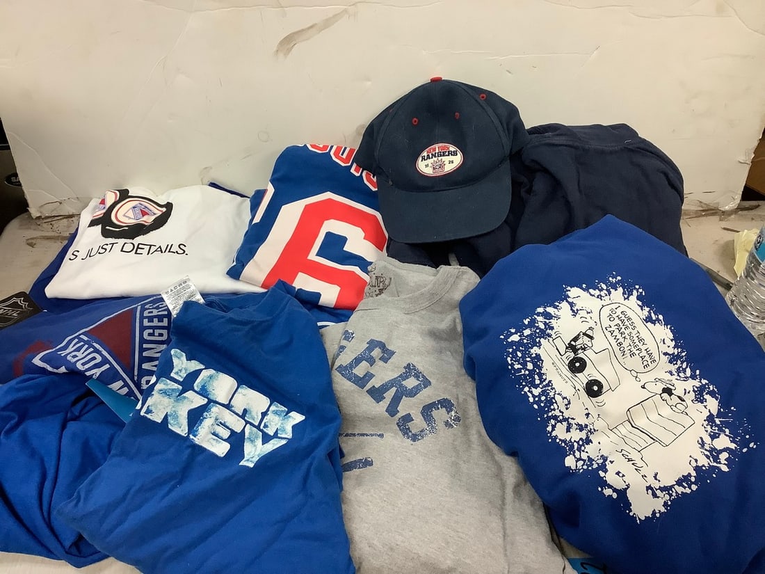 Lot of various sports clothing and cap (1 of 1)