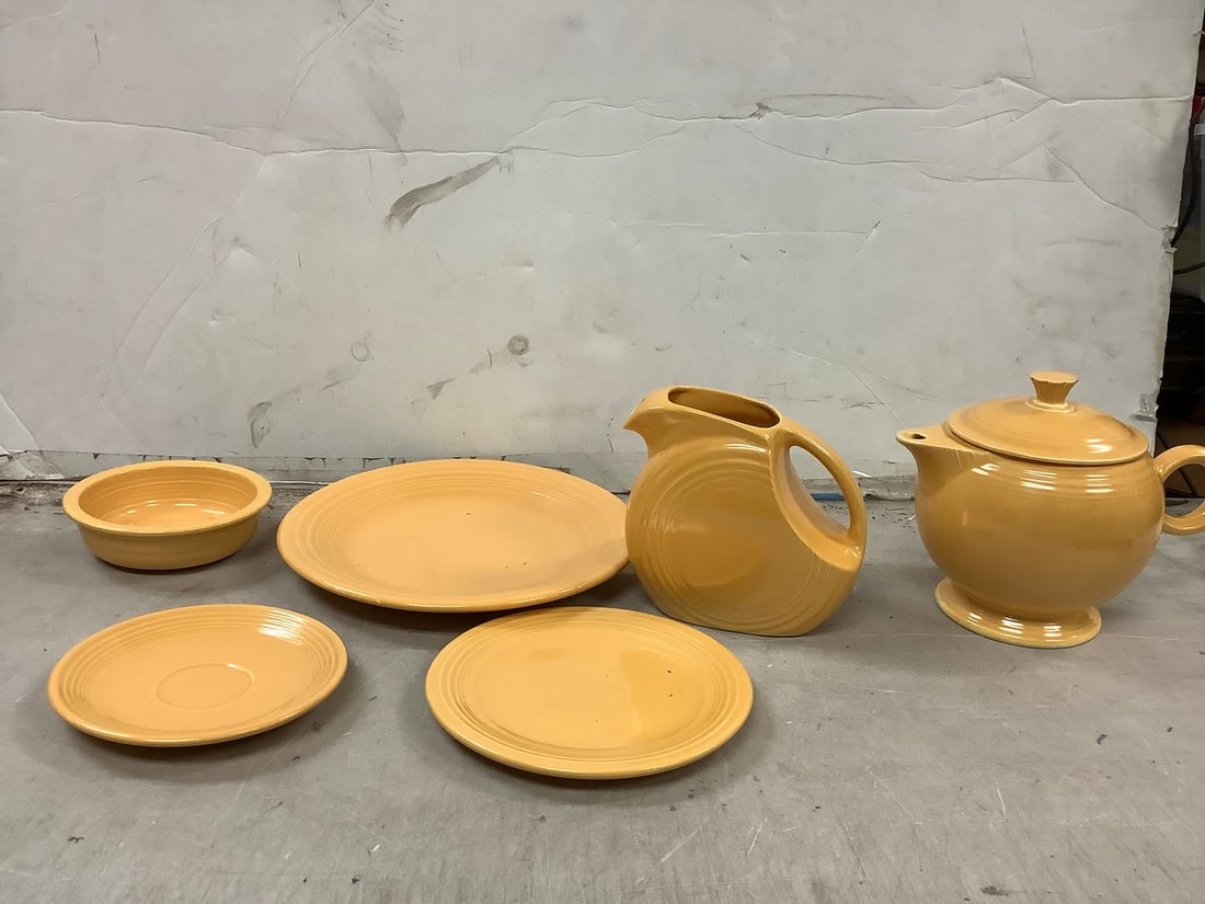 Lot of Fiesta ceramic set(plates, pitcher, and more) (1 of 1)