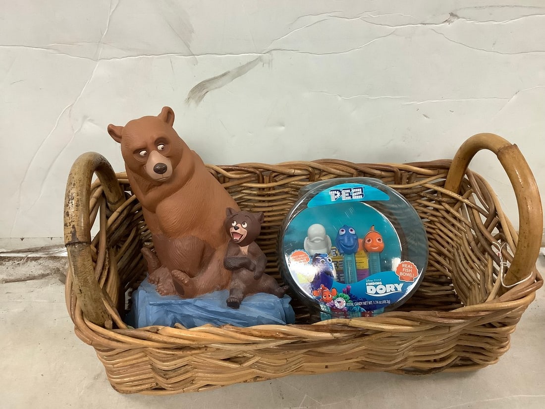 Lot of Finding Dory PEZ dispensers and Brother Bear slotted bank: Lot of Finding Dory PEZ dispensers and Brother Bear slotted bank