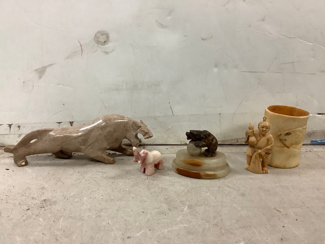 Cabo San Lucas jaguar statue(has been repaired), carved bone statue, and more: Cabo San Lucas jaguar statue(has been repaired), carved bone statue, and more