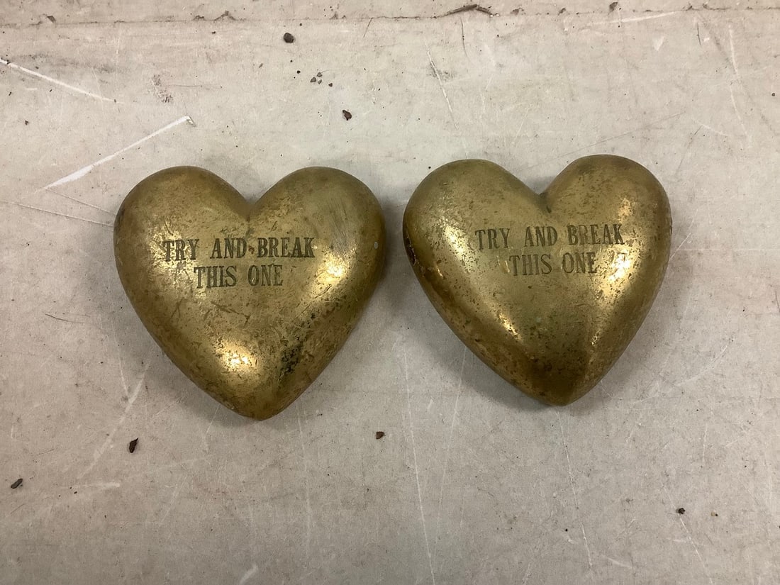 Lot of brass hearts, signed by artist Alex Shields NY: Lot of brass hearts, signed by artist Alex Shields NY
