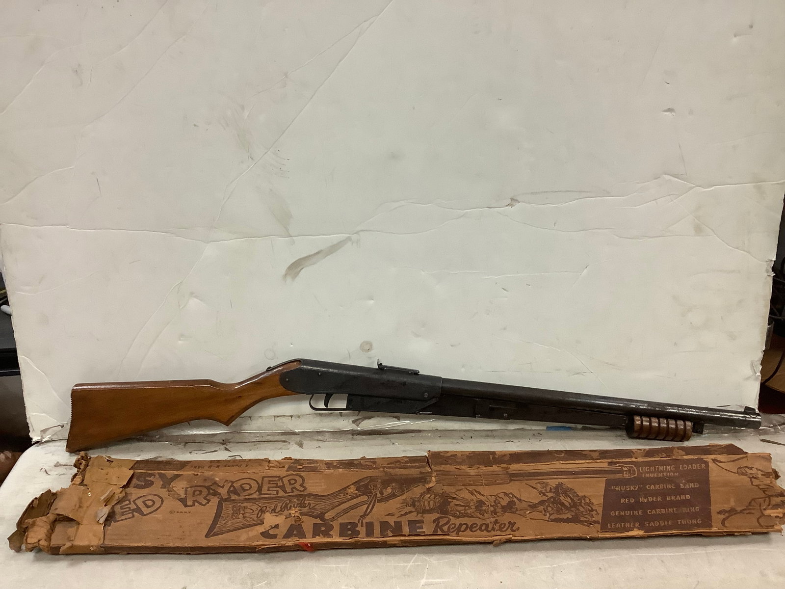 Hand pump toy gun with red rider vintage box: Hand pump toy gun with red rider vintage box