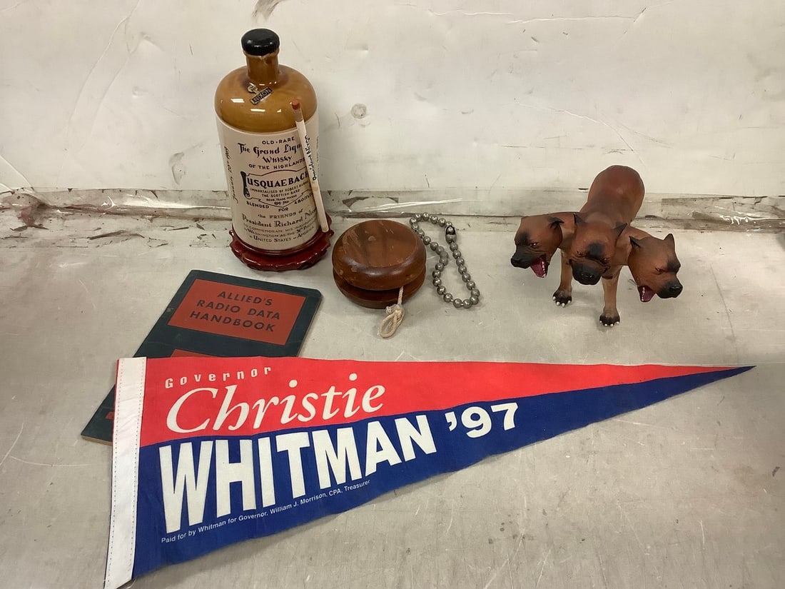 Lot of vintage yo-yo, political banner, 3-headed Warner Bros. dog, decorative Nixon liquor holder (1 of 1)